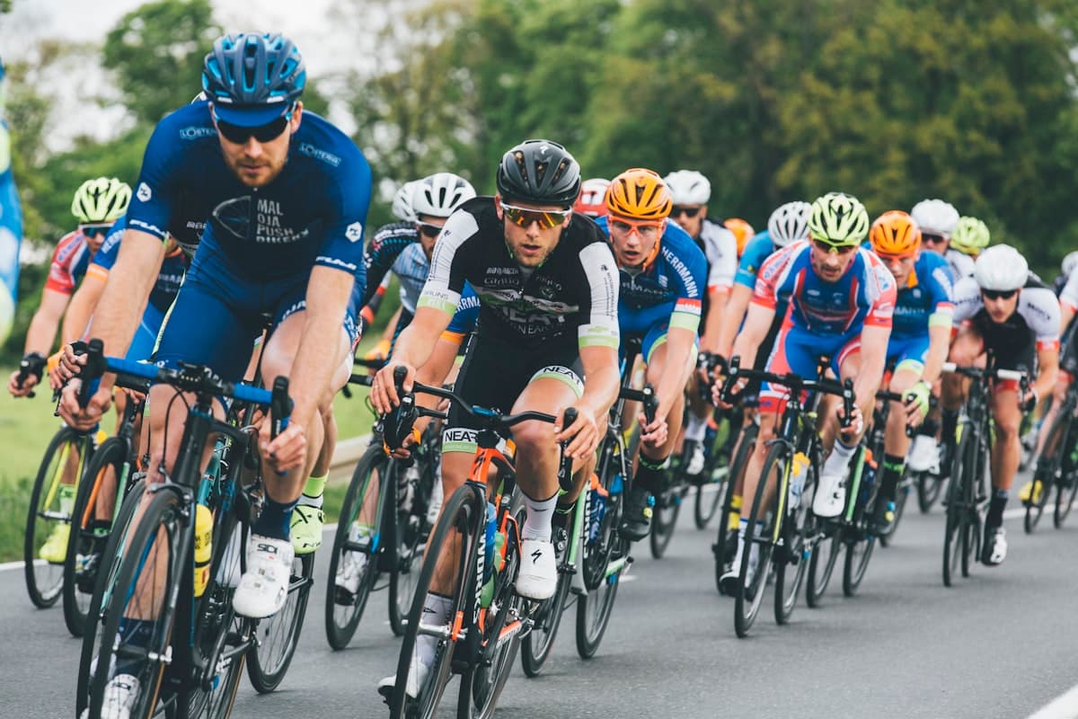 A training peloton of road cyclists riding in formation